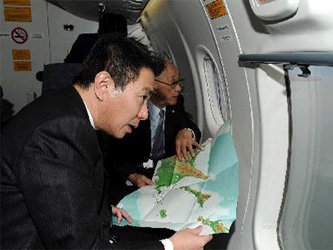 Сэйдзи Маэхара осматривает Хабомаи с воздуха. Фото с сайта chinanews.com