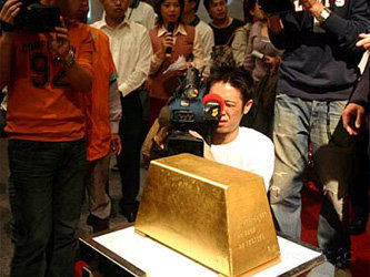 220-килограммовый слиток золота. Фото с сайта www.chinese-tools.com
