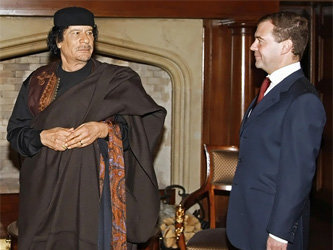 Лидер Ливии Муаммар Каддафи и президент России Дмитрий Медведев. Фото с сайта ruvr.ru