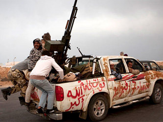 Ливийские повстанцы. Фото с сайта tundratabloids.com
