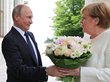 Путин удивил Меркель огромным букетом