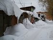 Пожилая женщина в Кузбассе погибла под лавиной снега с крыши