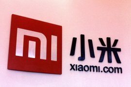 Логотип Xiaomi в офисе компании