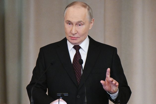 Путин