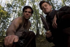 Кадр из фильма «Бесславные убдюдки»