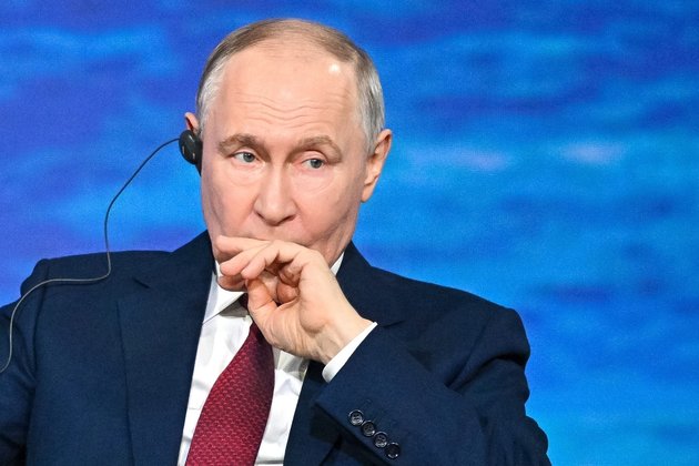 Путин